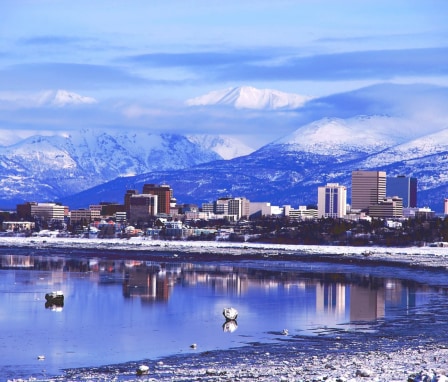 Downtown Anchorage, Alaska with mountains in background