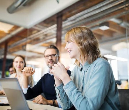 Colleagues talking together in a meeting