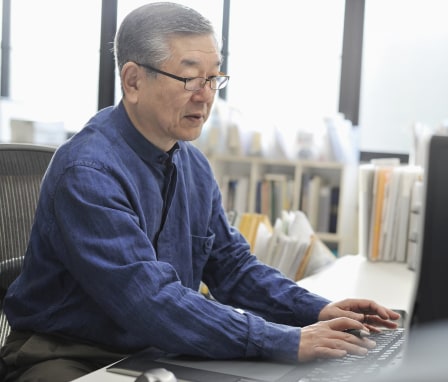 Man working on a computer in an office